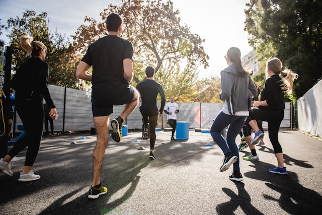 Group of people warming up for a run